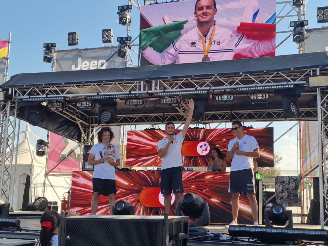 Sul palco di XMasters, gli atleti paralimpici Andrea Lanari, Luigi Casadei e Claudio De Vivo